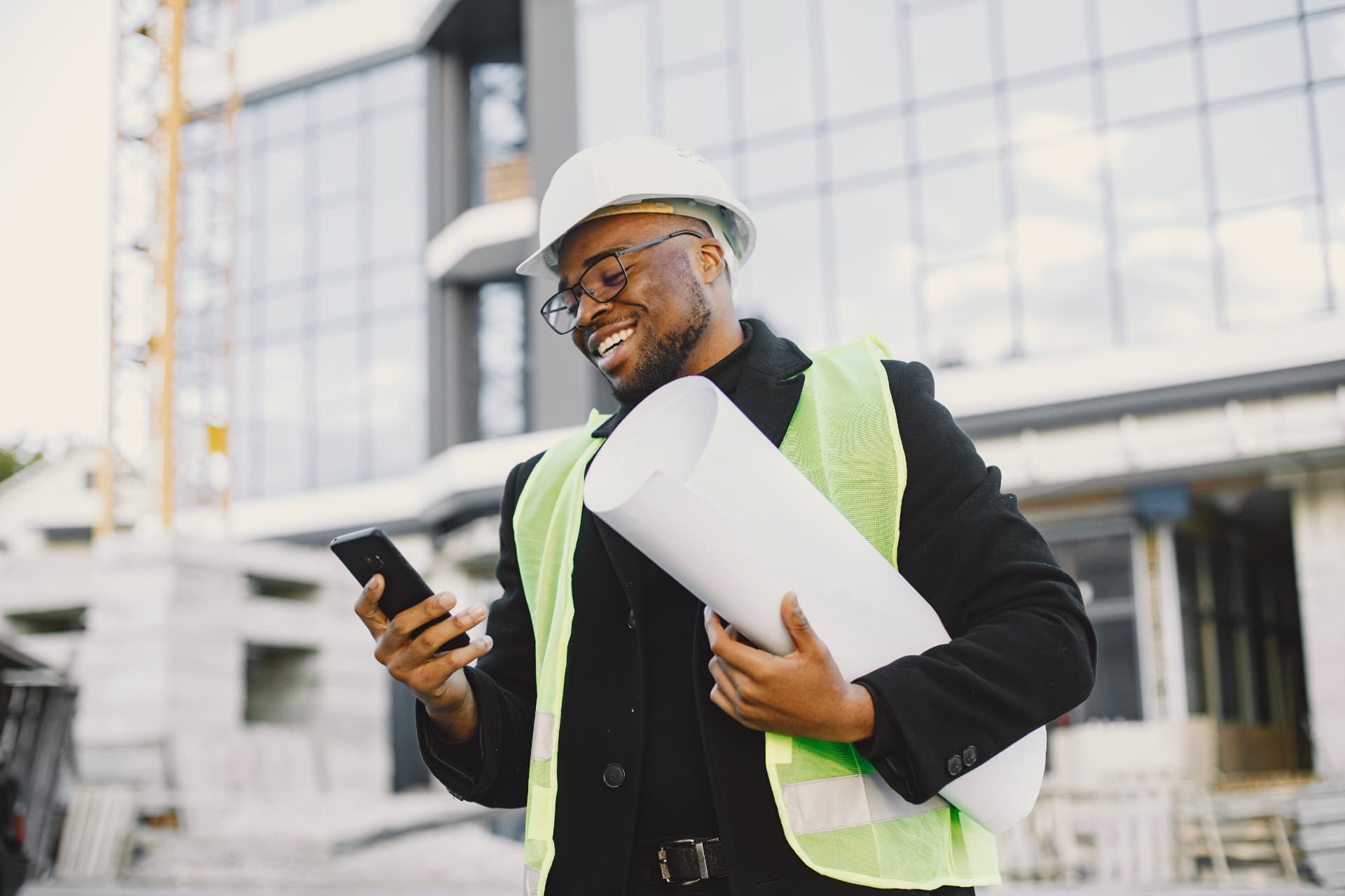 An architect reviewing a blueprint